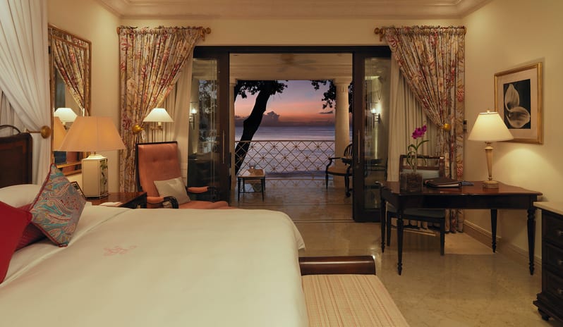 SANDY LANE - LUXURY OCEAN ROOM BED EVENING VIEW